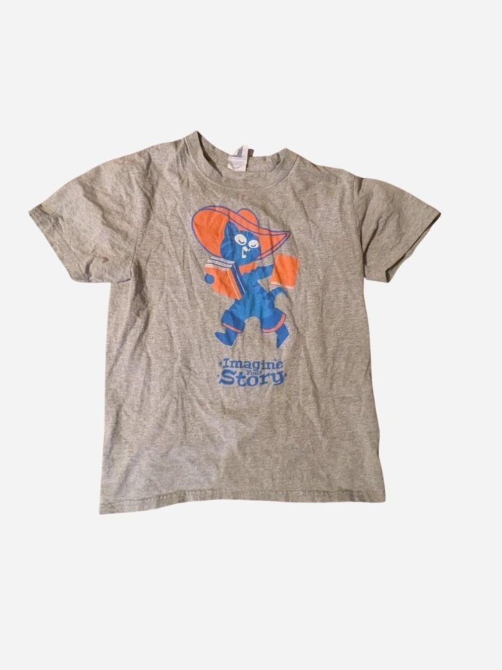 Gray t-shirt with blue cartoon cat graphic holding a book
